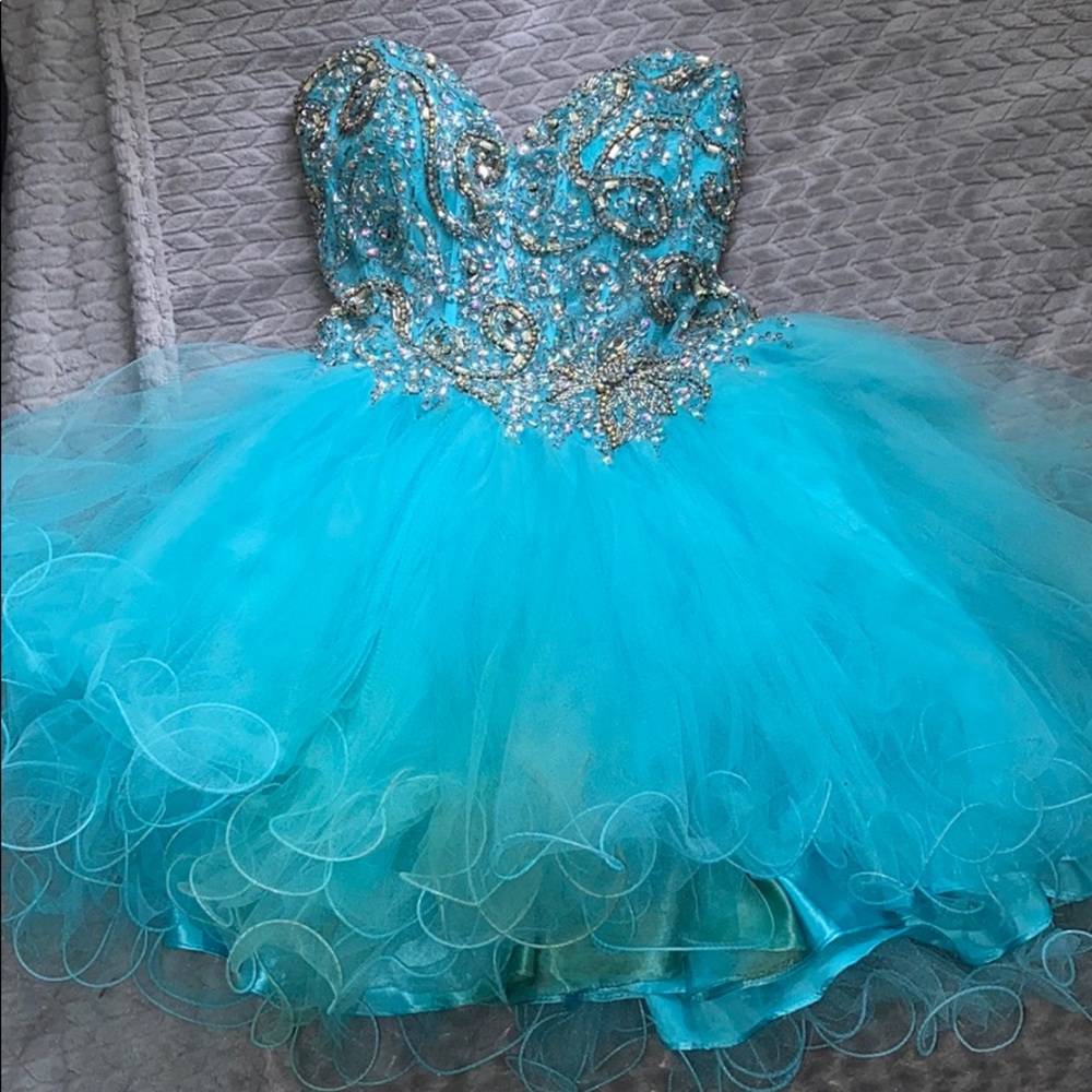 3 prom/homecoming dresses for $200 or $70 each.